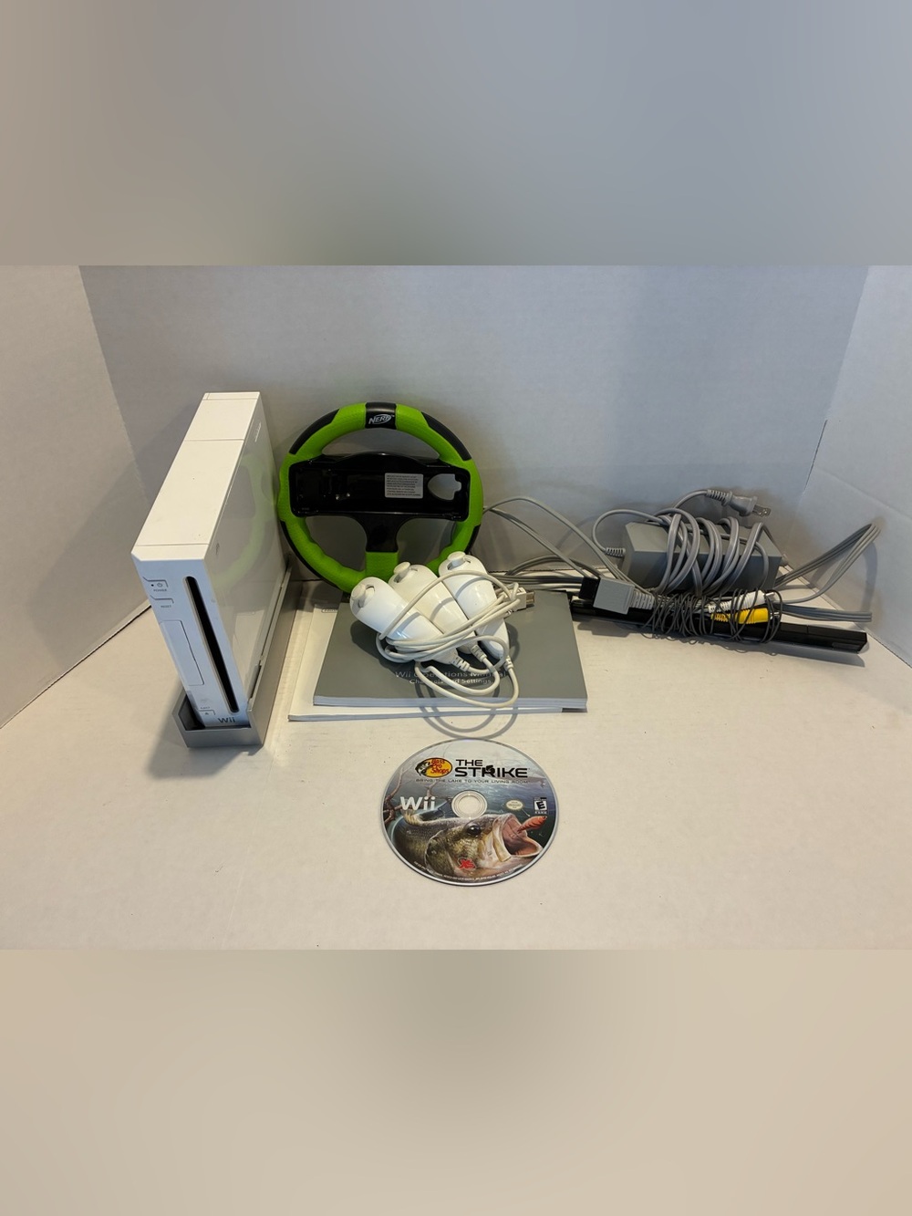 Nintendo Wii Bundle with Green Racing Wheel and White Controllers